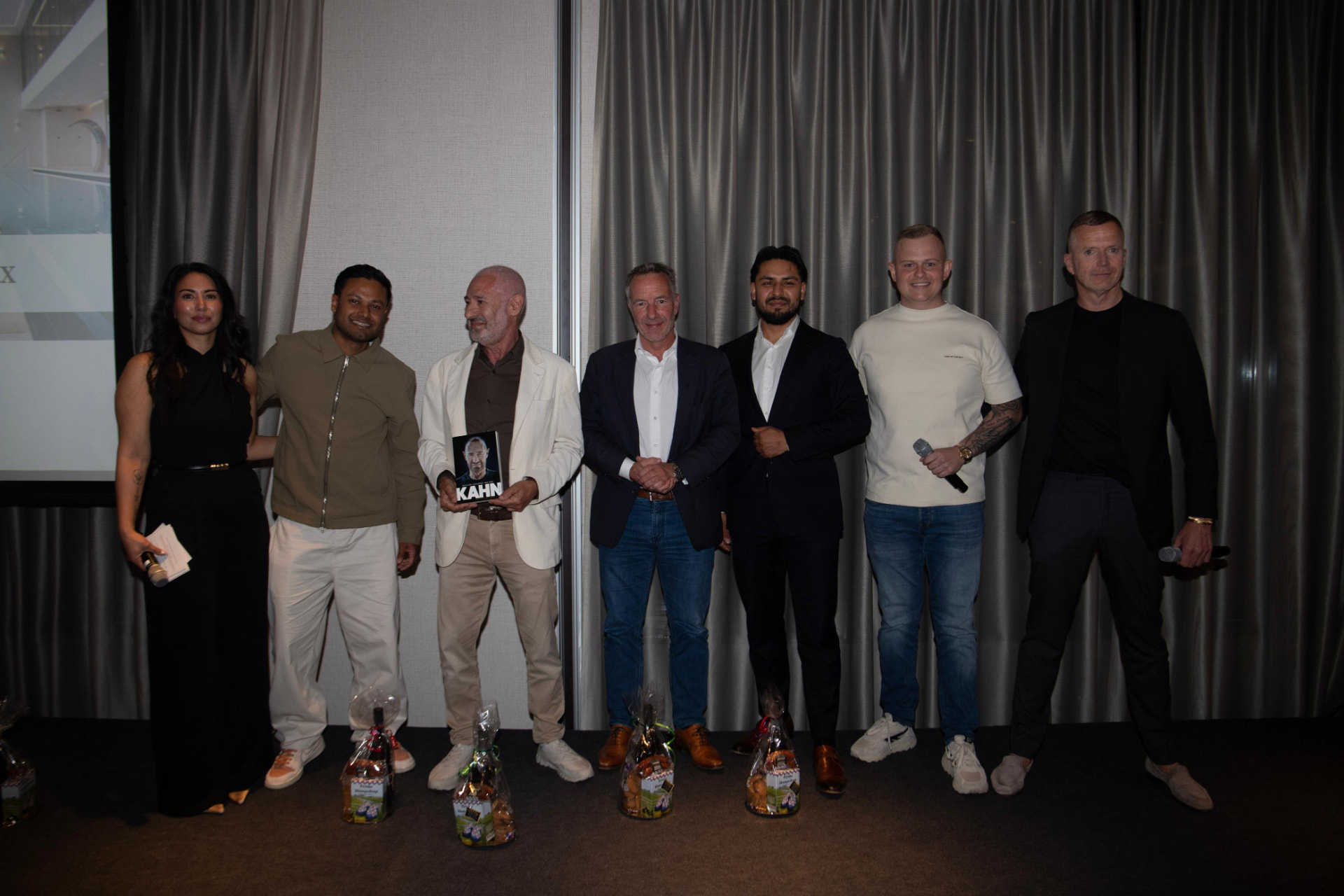Sprekers en organisatie op het podium tijdens de vorige editie